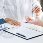 real-estate-agent-broker-and-customer-with-loan-or-2021-09-04-13-04-49-utc-1-1024x683